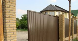 Купить откатные ворота из профнастила Алейск, цена от 1799 руб.